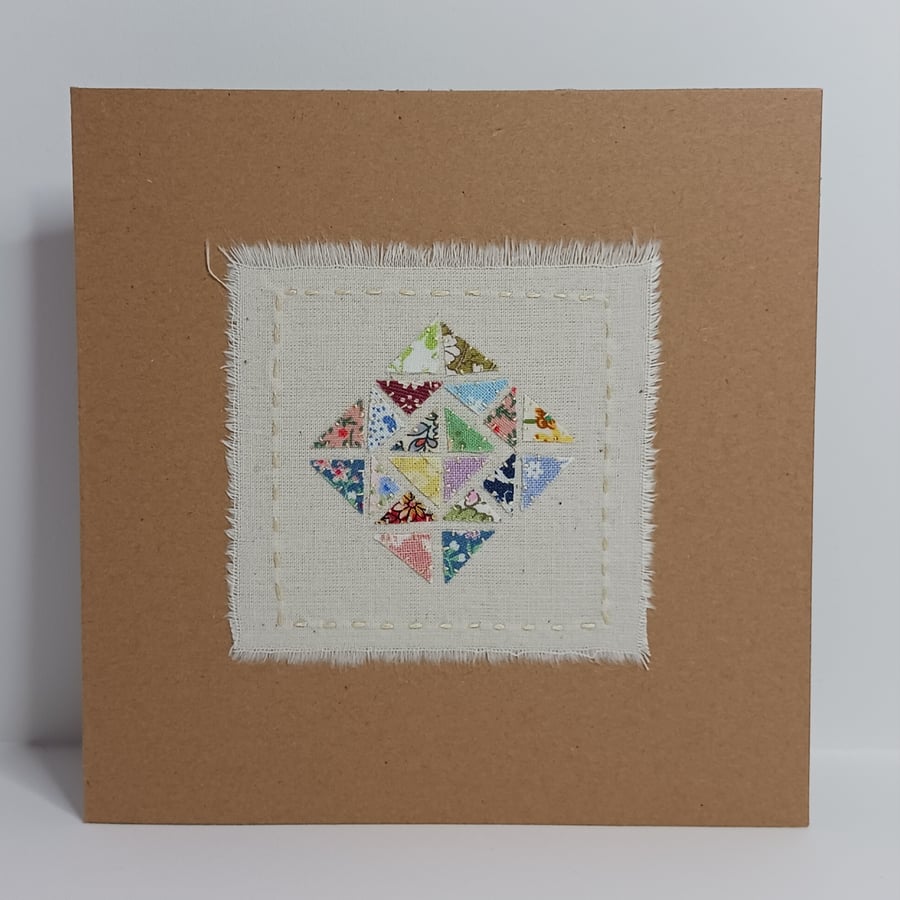 A Patchwork of vintage fabrics hand stitched card