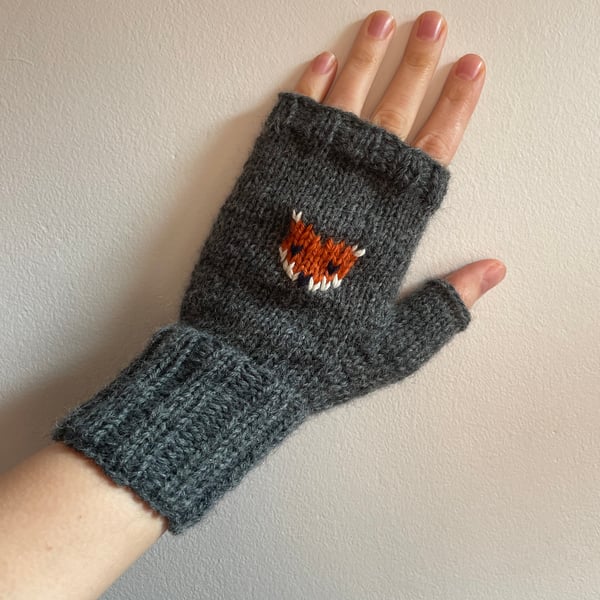 Hand knit dark grey wool fingerless gloves with embroidered fox pattern 