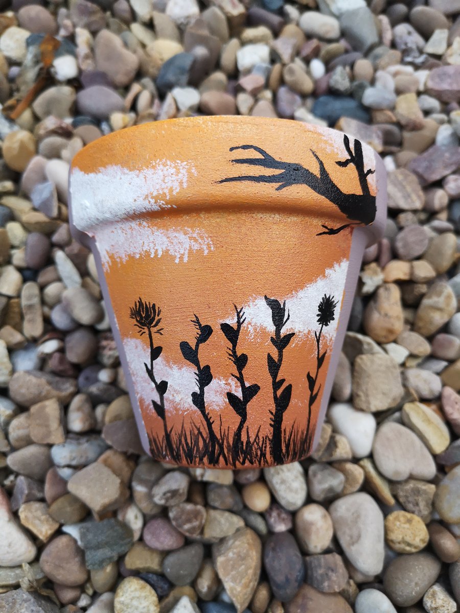 Orange sunset silhouette hand painted terracotta plant pot 