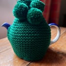 Hand knitted 2 pint (4 cup) tea cosy in Emerald Green with matching Pom poms