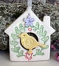 Small Ceramic bird house decoration with yellow bird