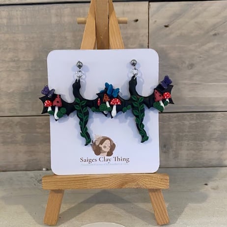 Black Dragon Earrings with mushrooms and fairy butterflies