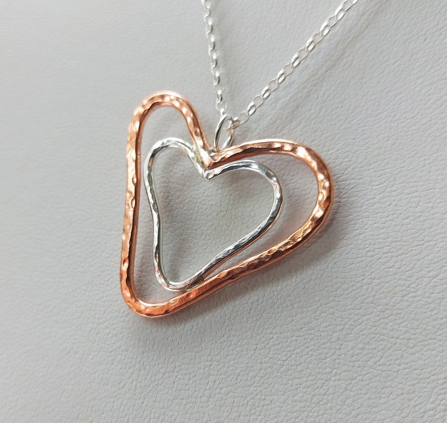 Nested Hearts Pendant mixed metals copper and Folksy