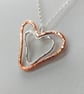 Nested Hearts Pendant, mixed metals, copper and sterling silver - Image 1