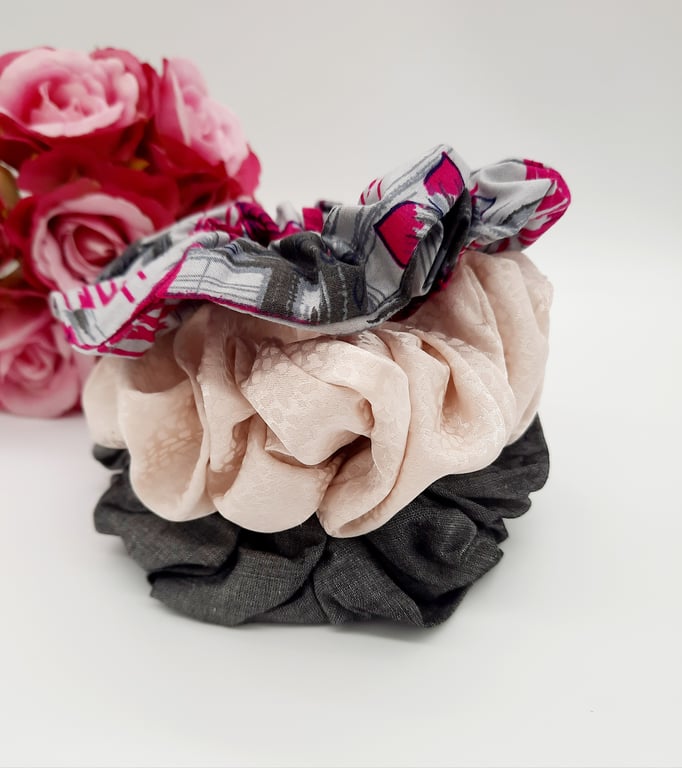 Set of 3 scrunchies,  grey, raspberry pink and cream satin. 