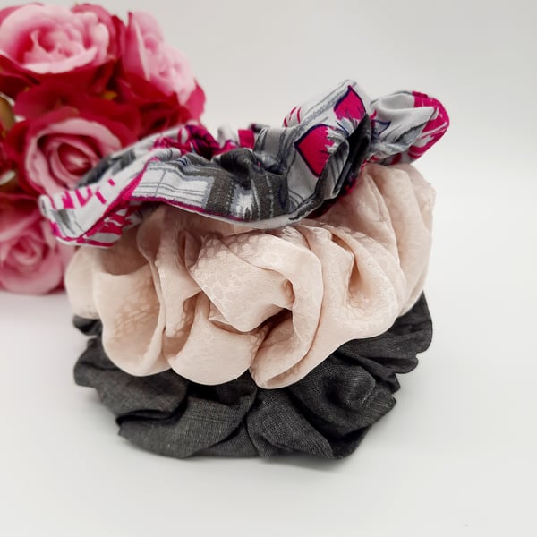 Set of 3 scrunchies,  grey, raspberry pink and cream satin. 