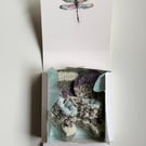 Knitted baby gift set with mittens and booties 