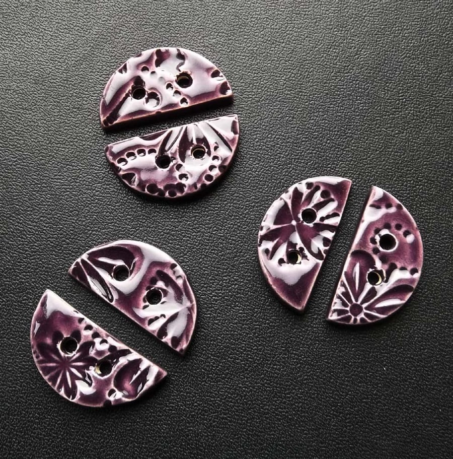 Set of six semi-circular purple ceramic buttons