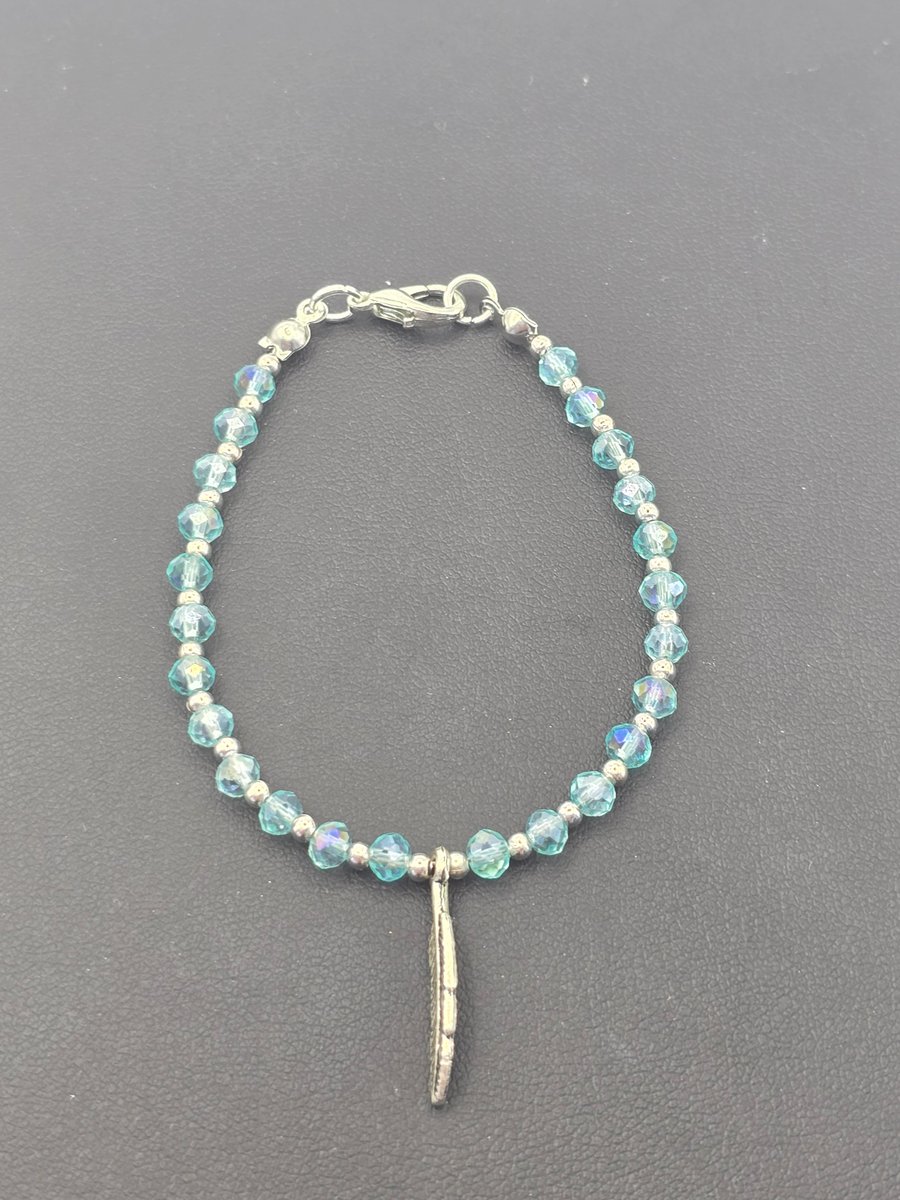 Kids light blue feather charm bracelet