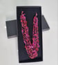 Crocheted necklace in shades of deep pink with a touch of gold, lightweight  - Image 1