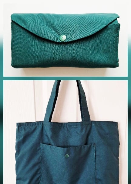 Forest green foldable shopping bag with a drawstring 