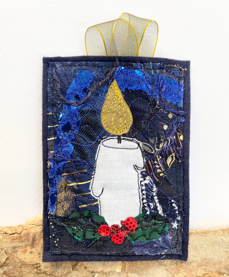 Upcycled embroidered candle with holly home Christmas decoration. 