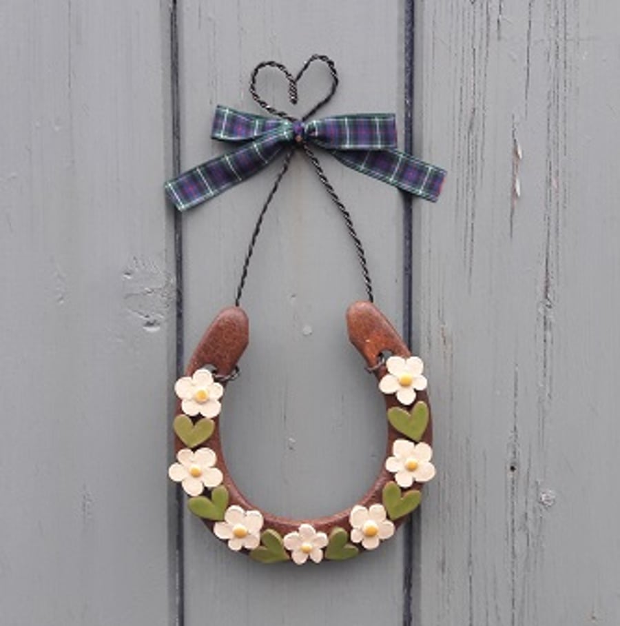 Real Horseshoe decorated with Pottery Pieces