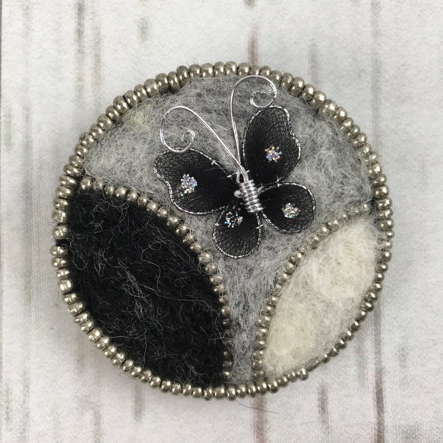 Seconds Sunday - Butterfly brooch, needle felted in black and grey with beading