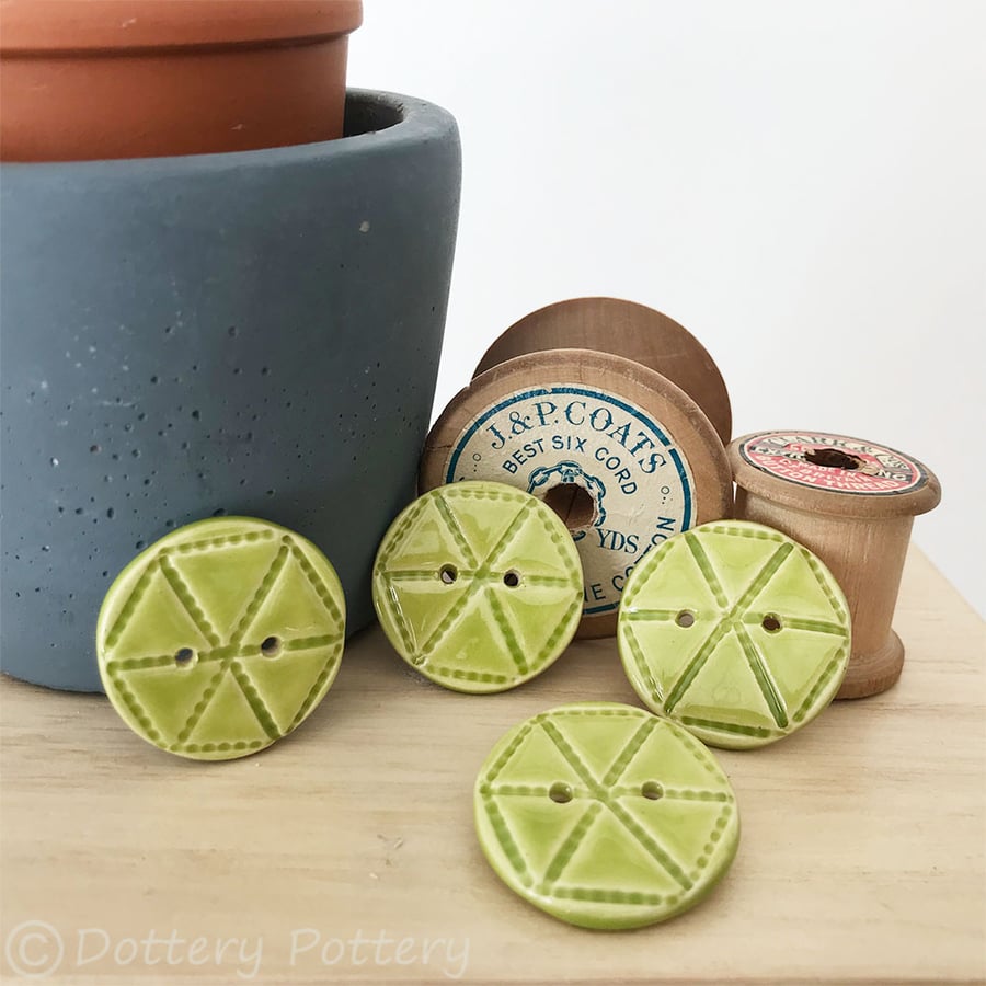 Set of four green ceramic handmade buttons