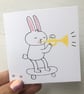 Skateboard Rabbit with Trumpet Screenprinted Card - Image 1