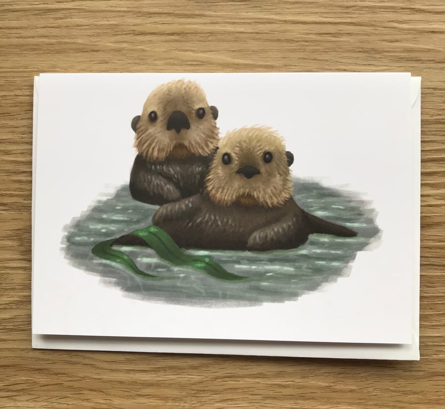 Sea Otters Greeting Card