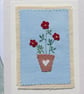 Hand-stitched applique red flowers in a pot with embroidered leaves  - Image 2