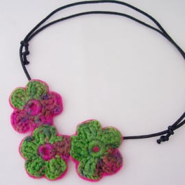 Crochet flower necklace in hot pink and emerald green