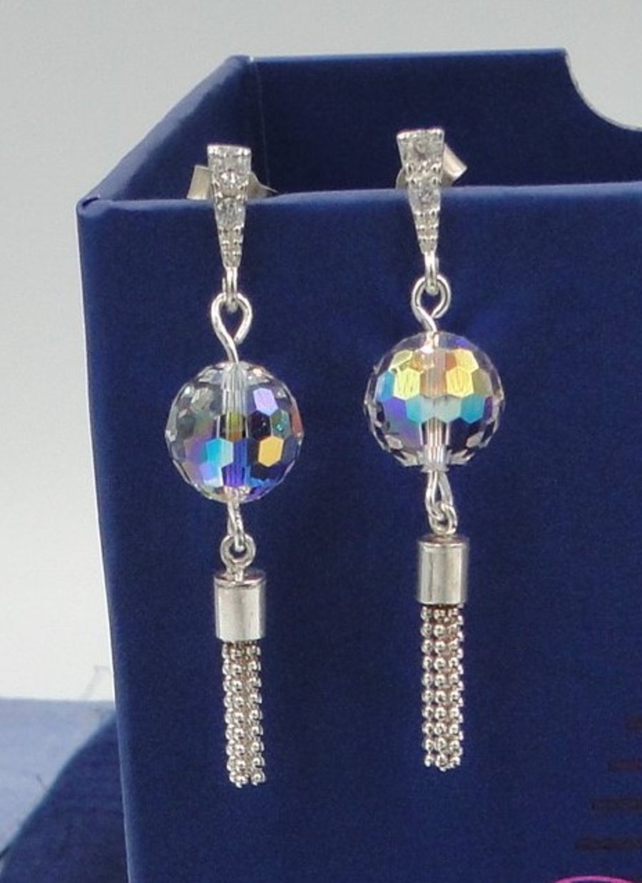 Sparkling Chrystal globe earrings with silver tassels