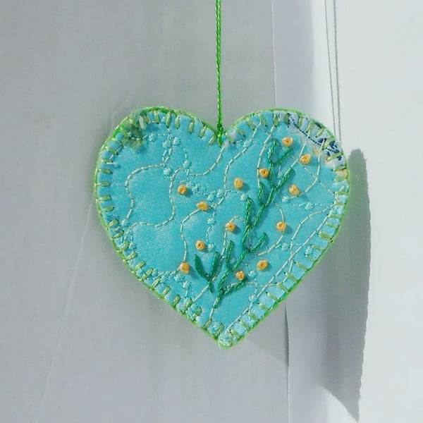 Textile art heart hanging ornament in turquoise and green