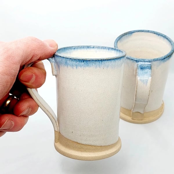 Blue and white ceramic tea or coffee mugs