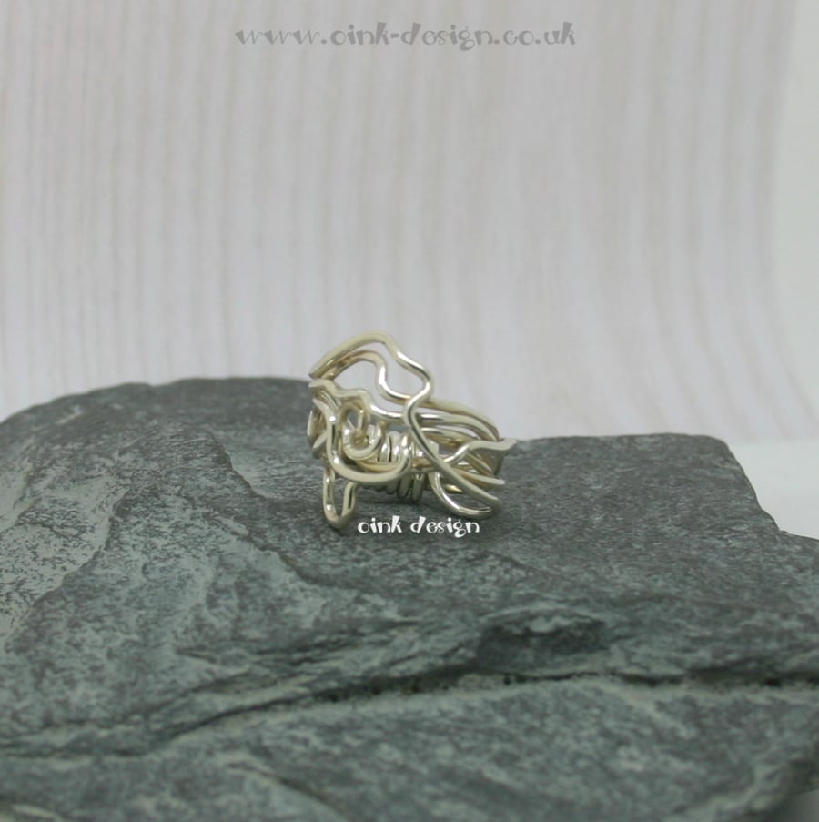 Sterling silver squiggle ring size H