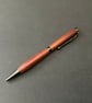 Slimline twist ballpoint pen made with pink ivory hardwood - black ink - Image 2