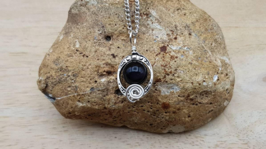 Minimalist rainbow obsidian pendant necklace.