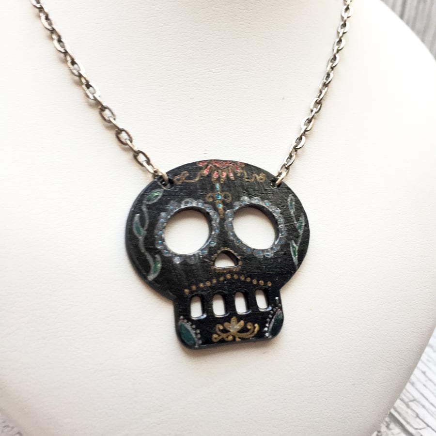 Day of the Dead Sugar Skull style pendant with decorative doodle design