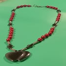 Handmade red beaded necklace black two heart pendant