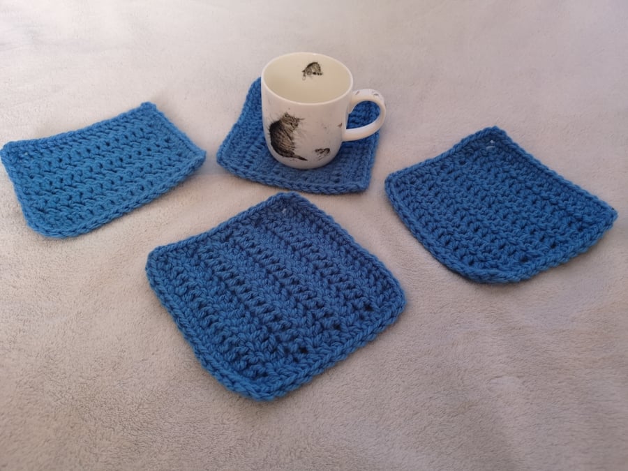 Set of 4 large blue crochet coasters