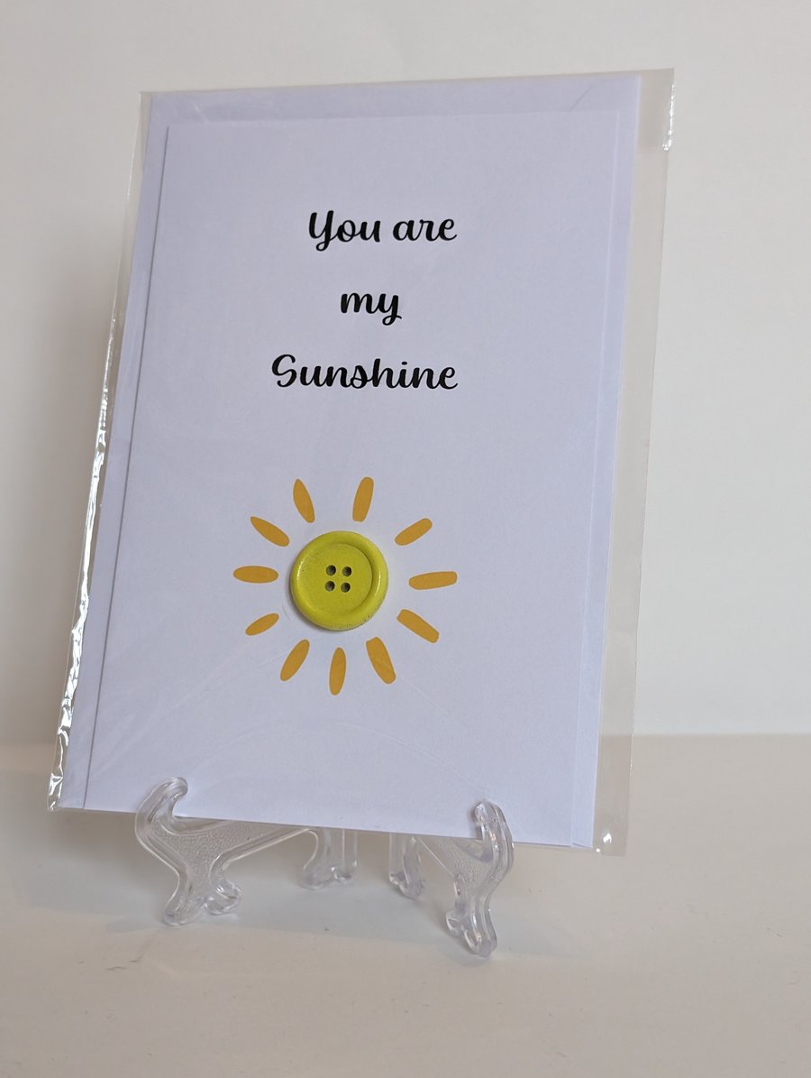 "You are my sunshine" greetings card with a yellow button sun