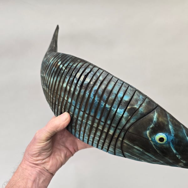 Articulating fish in pine