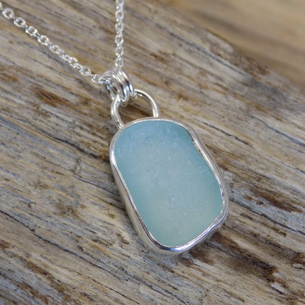 Silver bezel set baby blue sea glass pendant 