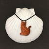 Ginger and white cat pendant, resin and ink on black cord necklace.