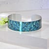 Artistic jewellery bracelet, narrow metal cuff with teal floral design. B137