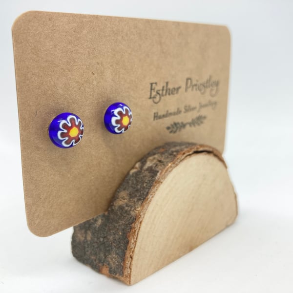 Bright blue fused glass earrings with pretty red flower design on silver studs 