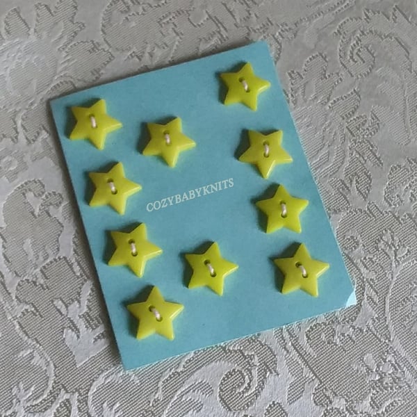 Pale yellow star plastic buttons