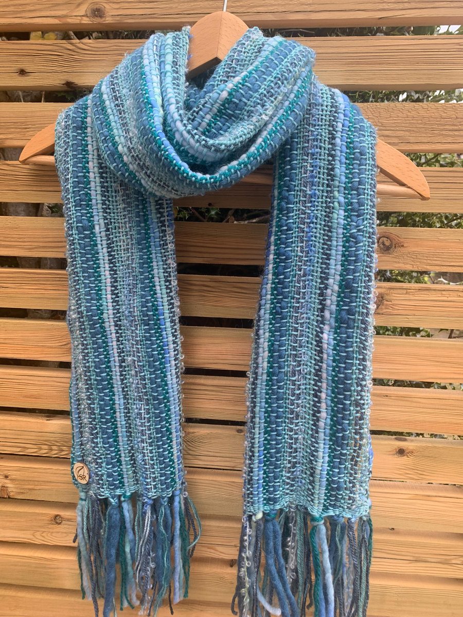 Handwoven statement scarf in shades of turquoise teal and blue