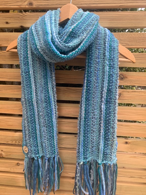Handwoven statement scarf in shades of turquoise teal and blue