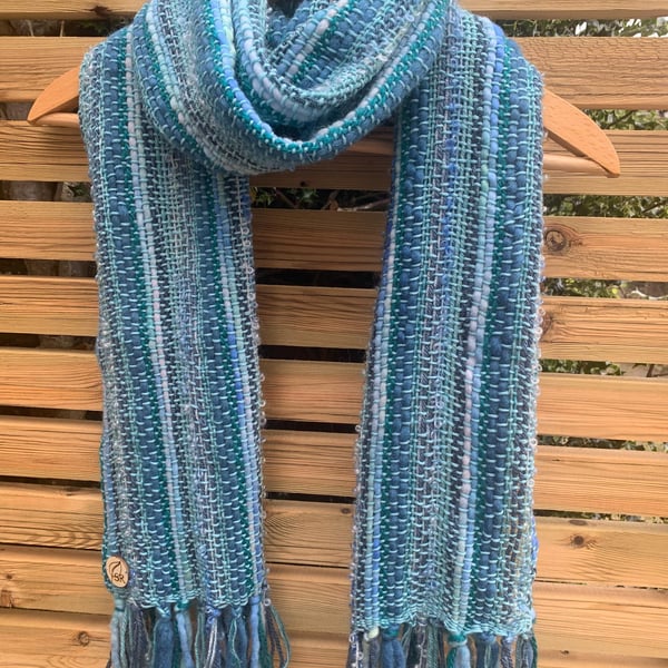 Handwoven statement scarf in shades of turquoise teal and blue