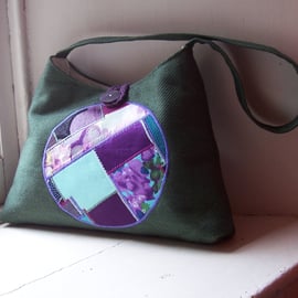 Textile shoulder bag in forest green with art panel