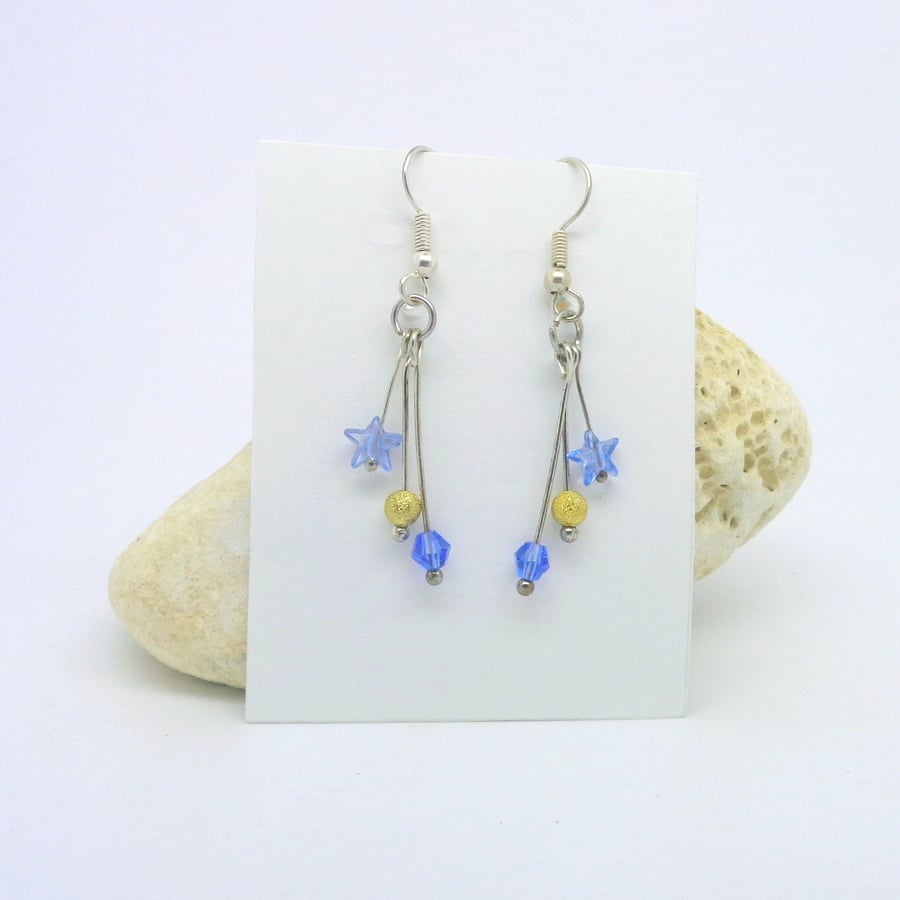 Silver plated dangle earrings with blue stars crystals & stardust gold beads