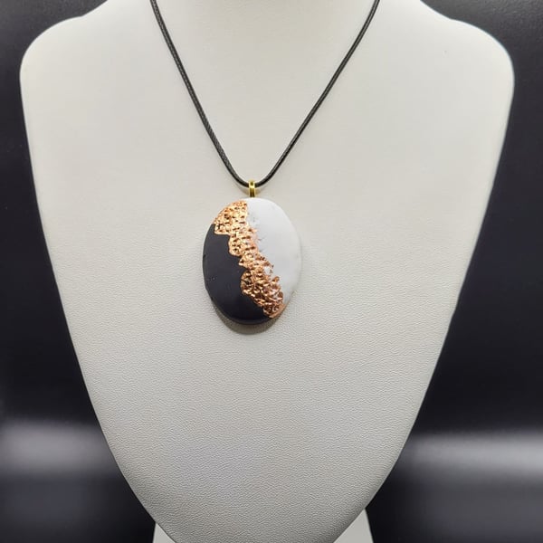 Black and white polymer clay pendant necklace with gold leaf detail handmade cos