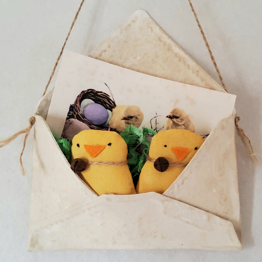 Easter chicks in a cloth hanging envelope