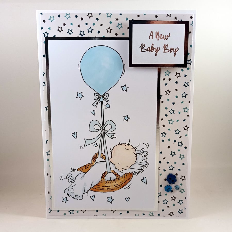New baby boy card - baby in balloon basket