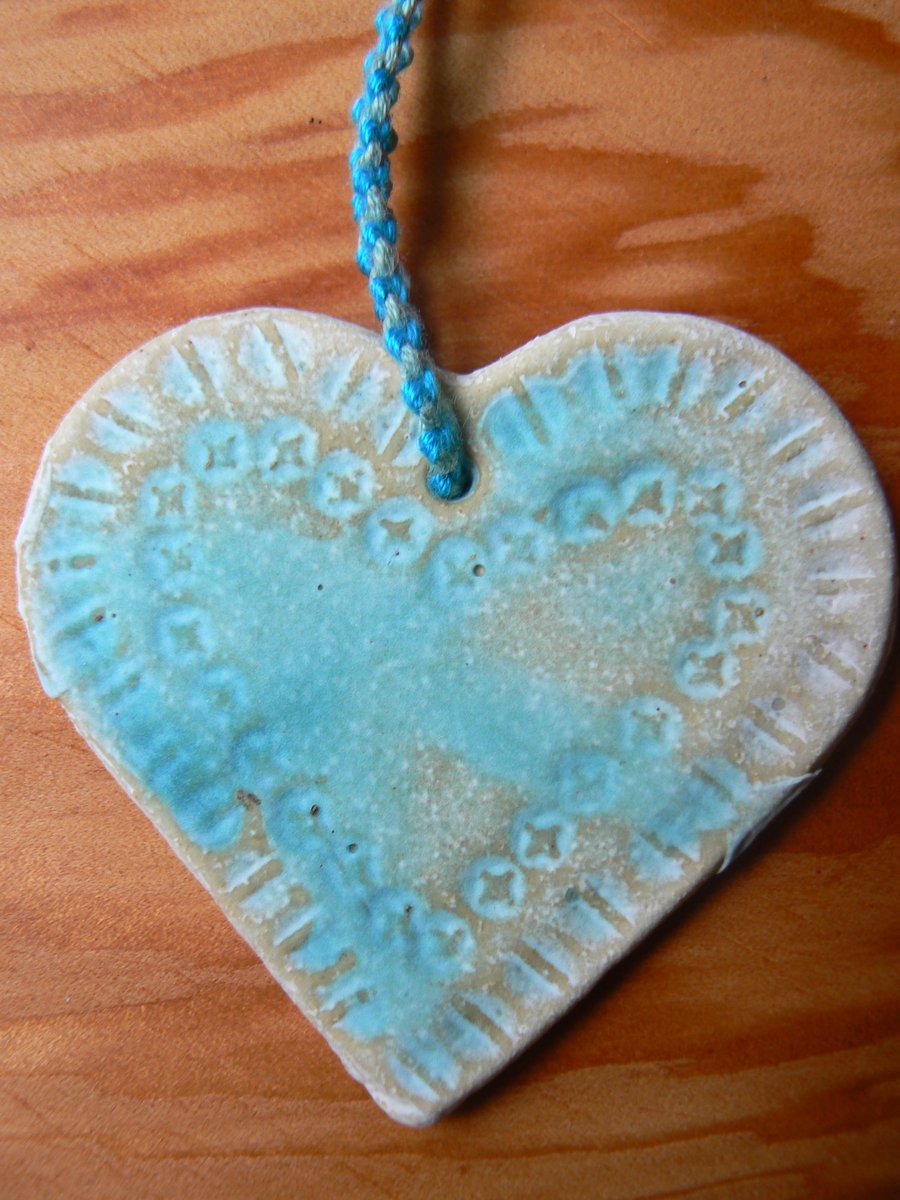 Heart in Ceramic with a Turquoise Glaze.