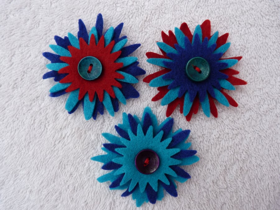 Felt Corsage in Reds Blue and Turquoise  with Wooden Button