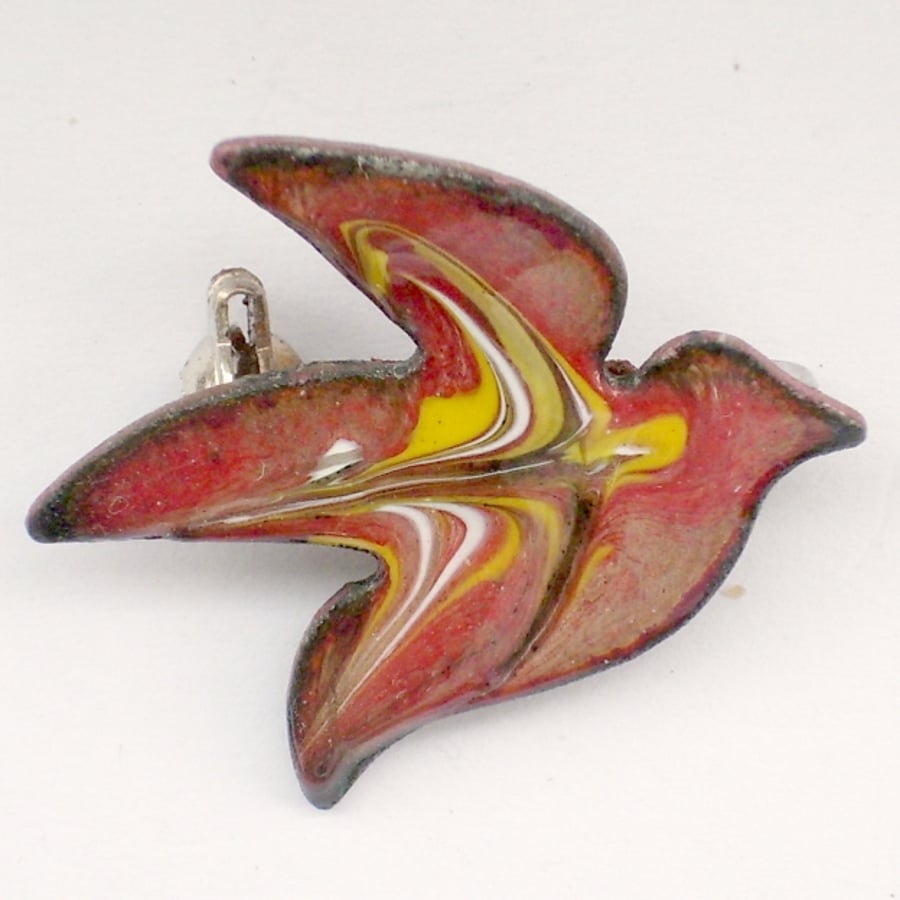 enamel brooch - bird scrolled white and yellow over red